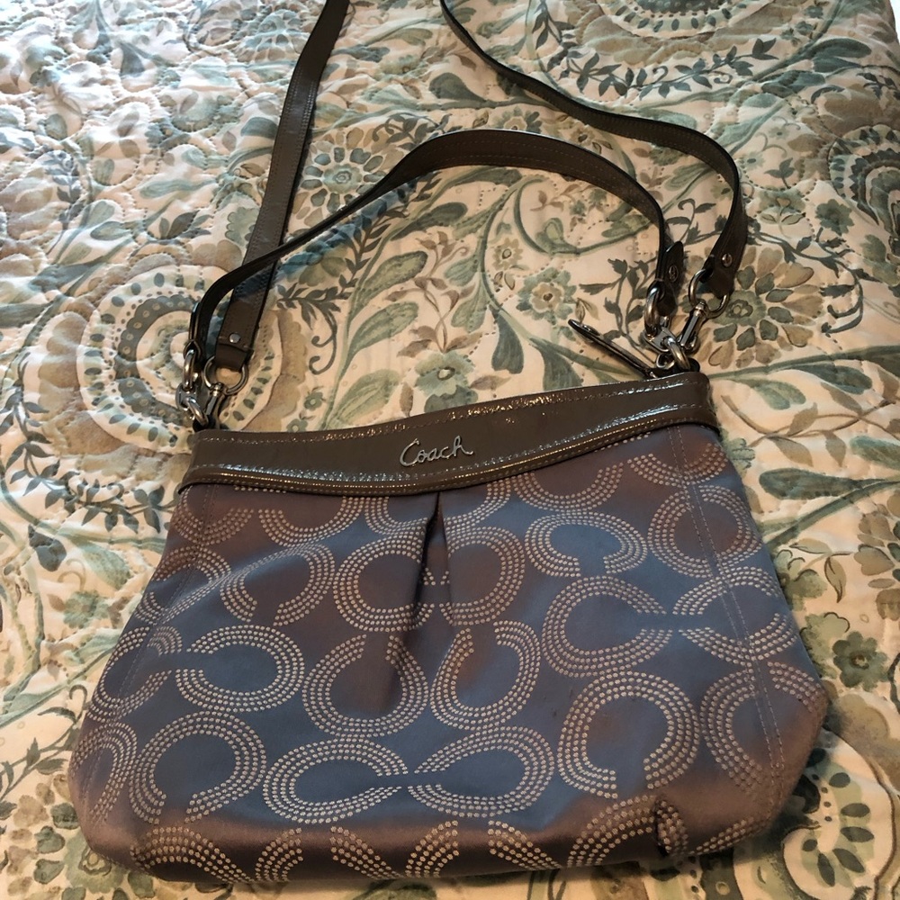 Light grey authentic coach crossbody bag.